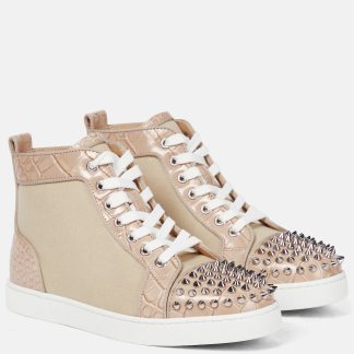 modeontwerper Christian Louboutin Lou Spikes canvas sneakers beige